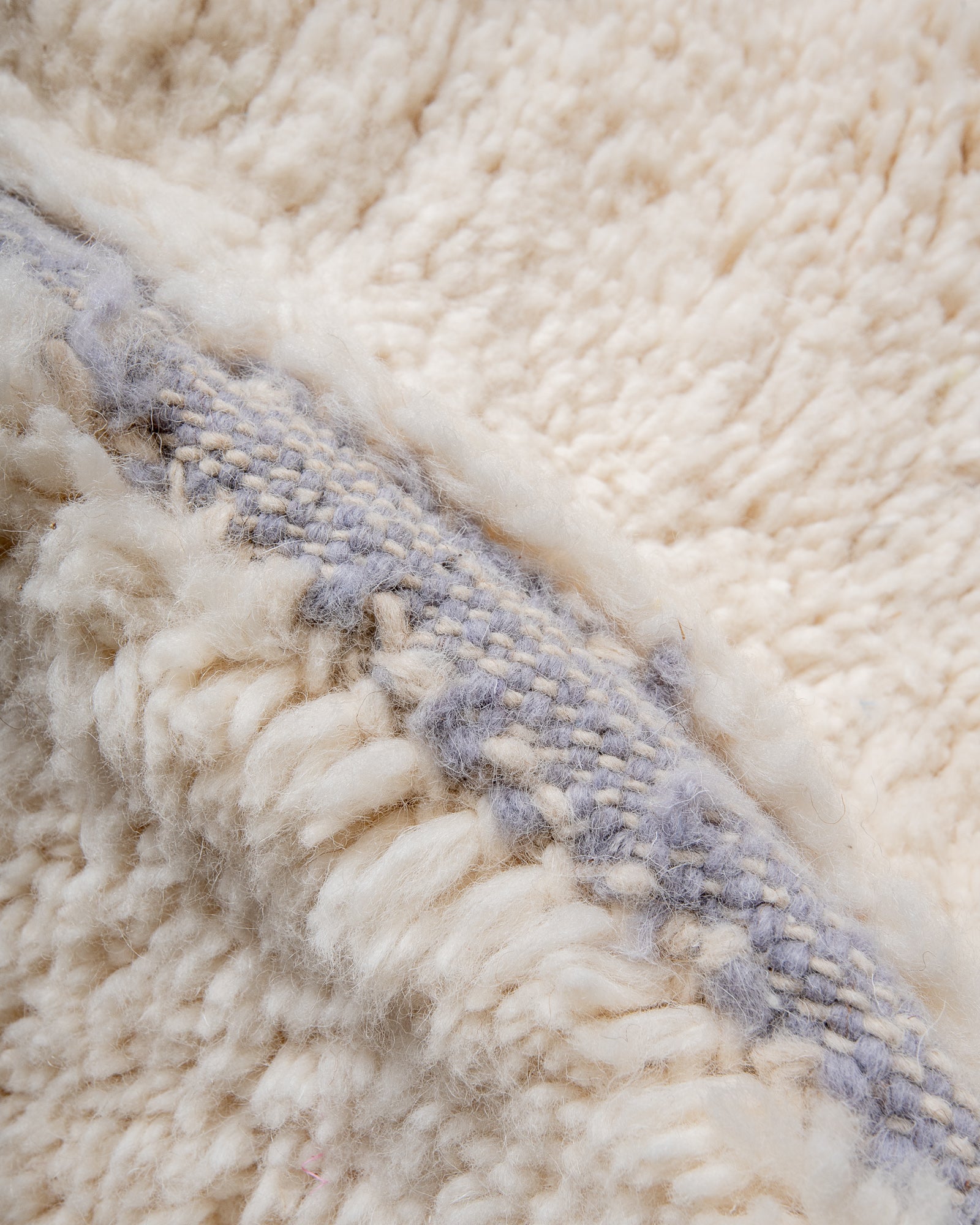 Modern, designer, handcrafted Berber rug from Morocco. Beniourain carpet with beautiful colours and patterns and fluffy wool texture.