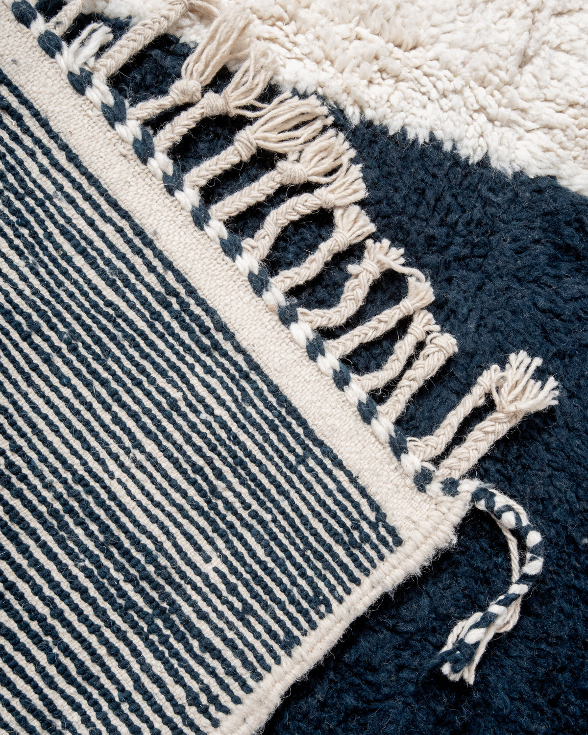 Modern, designer, handcrafted Berber rug from Morocco. Beniourain carpet with beautiful colours and patterns and fluffy wool texture.