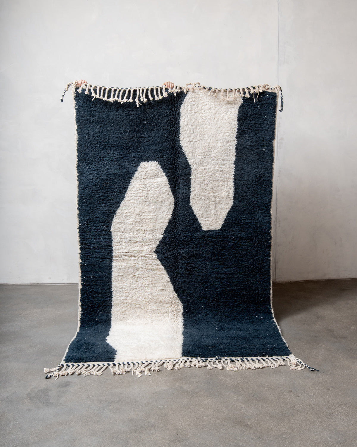 Modern, designer, handcrafted Berber rug from Morocco. Beniourain carpet with beautiful colours and patterns and fluffy wool texture.
