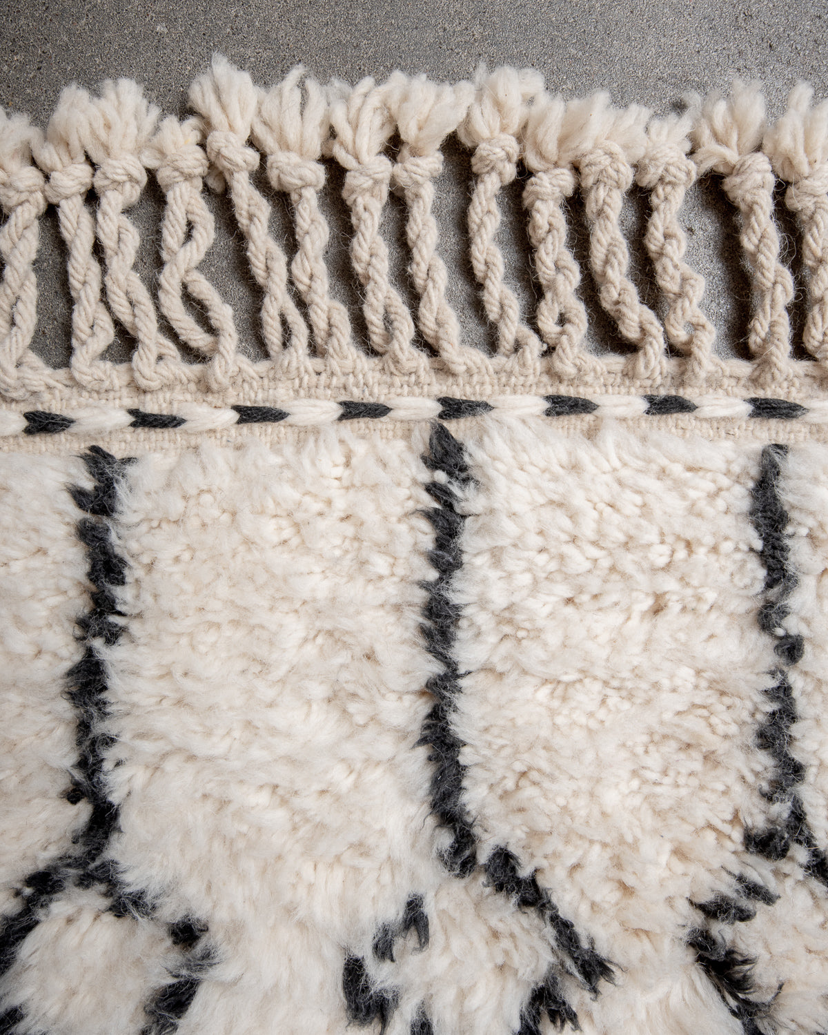 Modern, designer, handcrafted Berber rug from Morocco. Beniourain carpet with beautiful colours and patterns and fluffy wool texture.