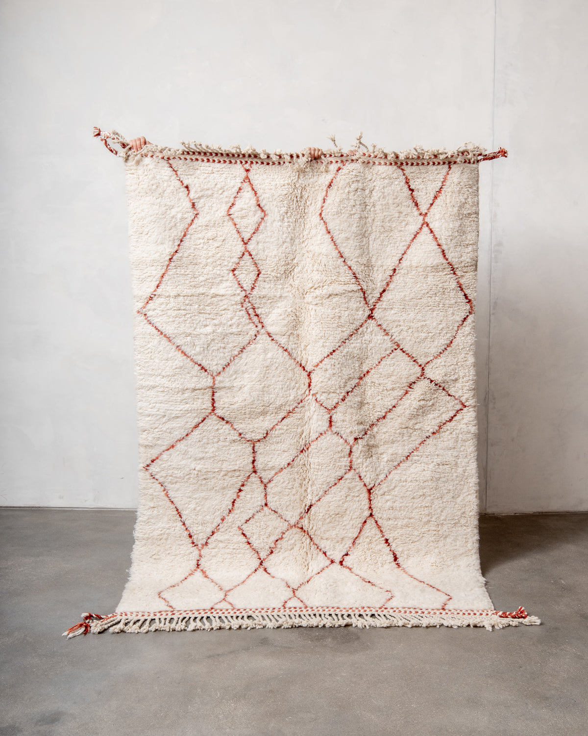 Modern, designer, handcrafted Berber rug from Morocco. Beniourain carpet with beautiful colours and patterns and fluffy wool texture.