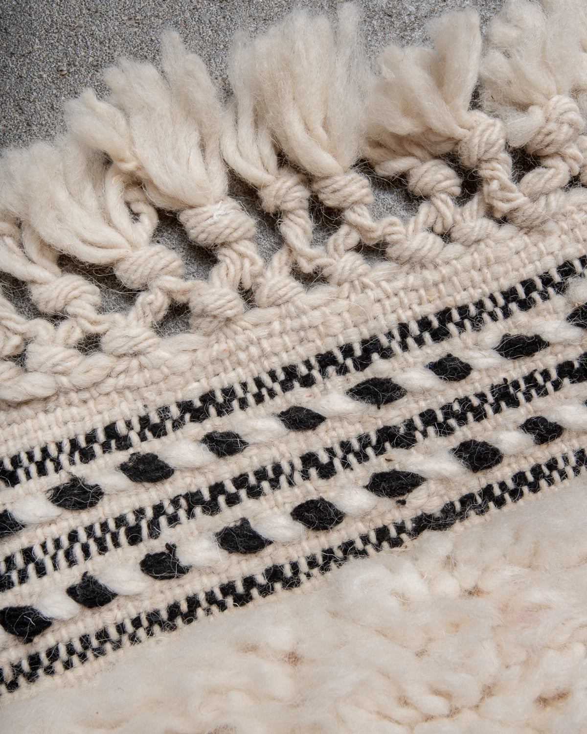 Modern, designer, handcrafted Berber rug from Morocco. Beniourain carpet with minimalist design, natural wool pile and a fluffy texture.