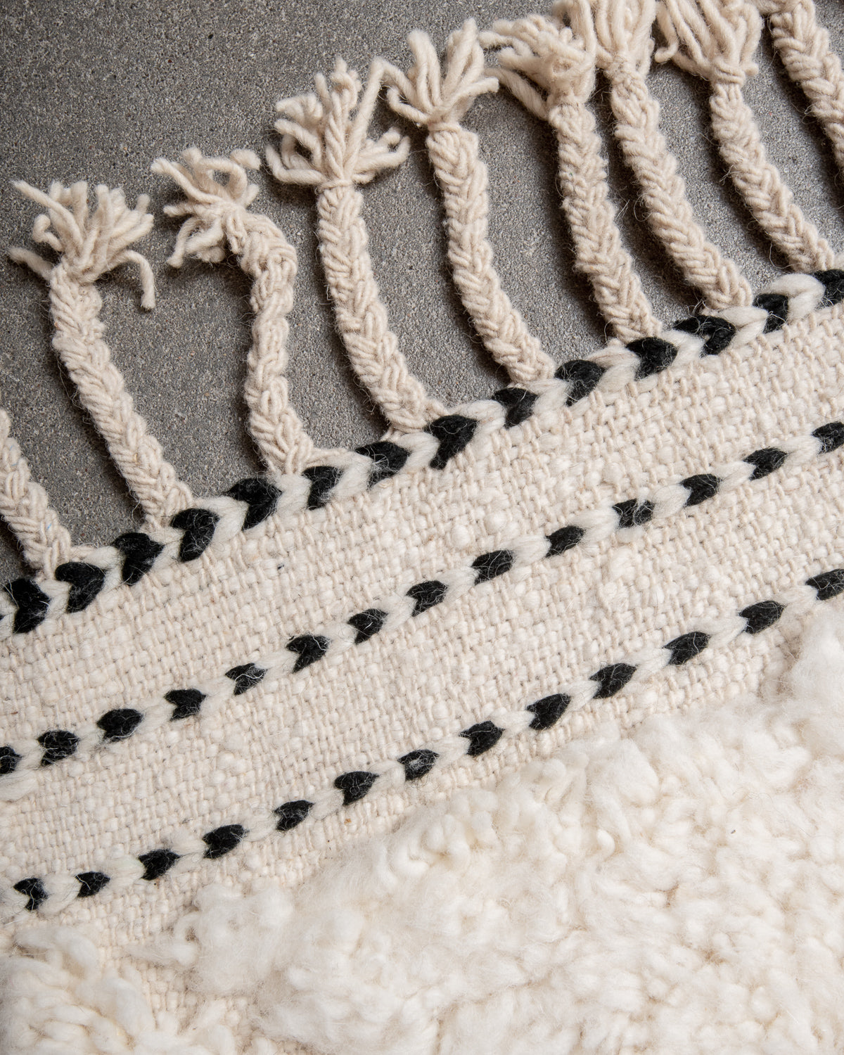 Modern, designer, handcrafted Berber rug from Morocco. Beniourain carpet with minimalist design, natural wool pile and a fluffy texture.