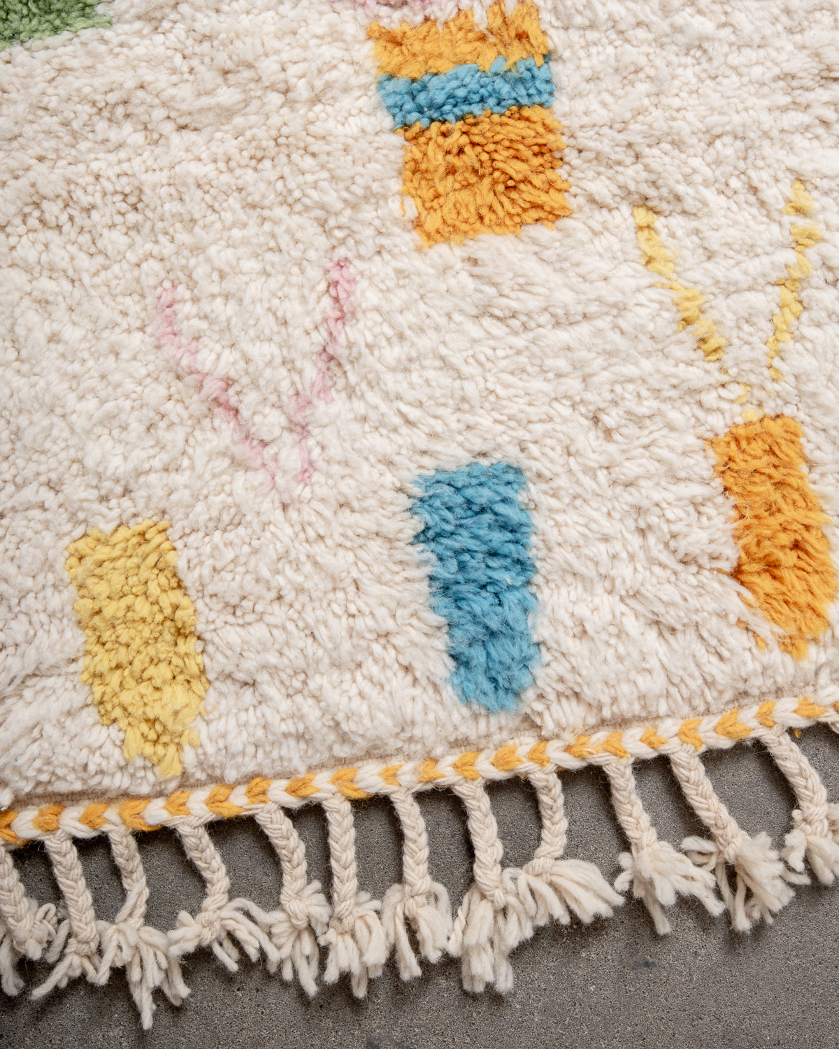 Modern, designer, handcrafted Berber rug from Morocco. Beniourain carpet with beautiful colours and patterns and fluffy wool texture.