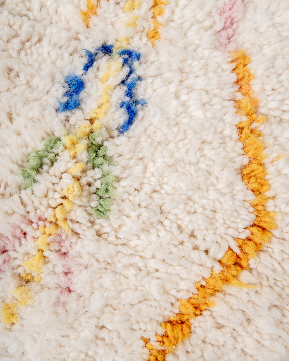 Modern, designer, handcrafted Berber rug from Morocco. Beniourain carpet with beautiful colours and patterns and fluffy wool texture.