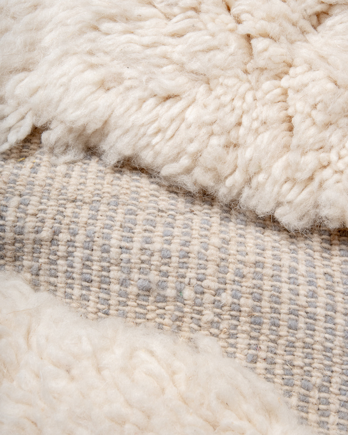 Modern, designer, handcrafted Berber rug from Morocco. Beniourain carpet with beautiful colours and patterns and fluffy wool texture.