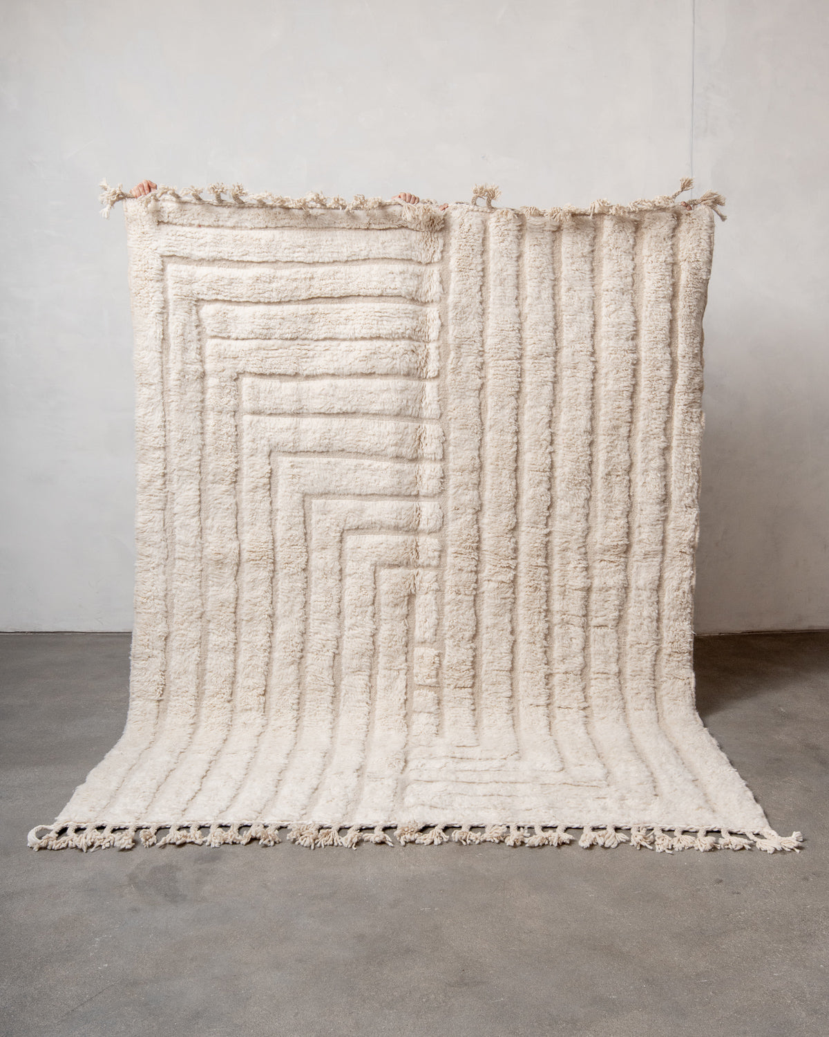 Modern, designer, handcrafted Berber rug from Morocco. Beniourain carpet with minimalist design, natural wool pile and a fluffy texture.