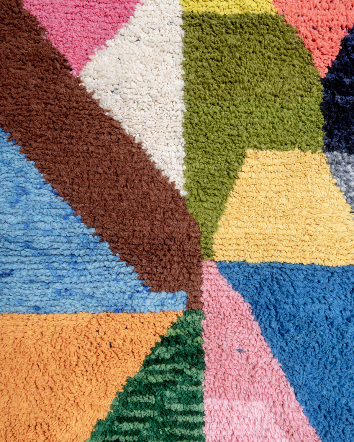 Modern, designer, handcrafted Berber rug from Morocco. Beniourain carpet with beautiful colours and patterns and fluffy wool texture.