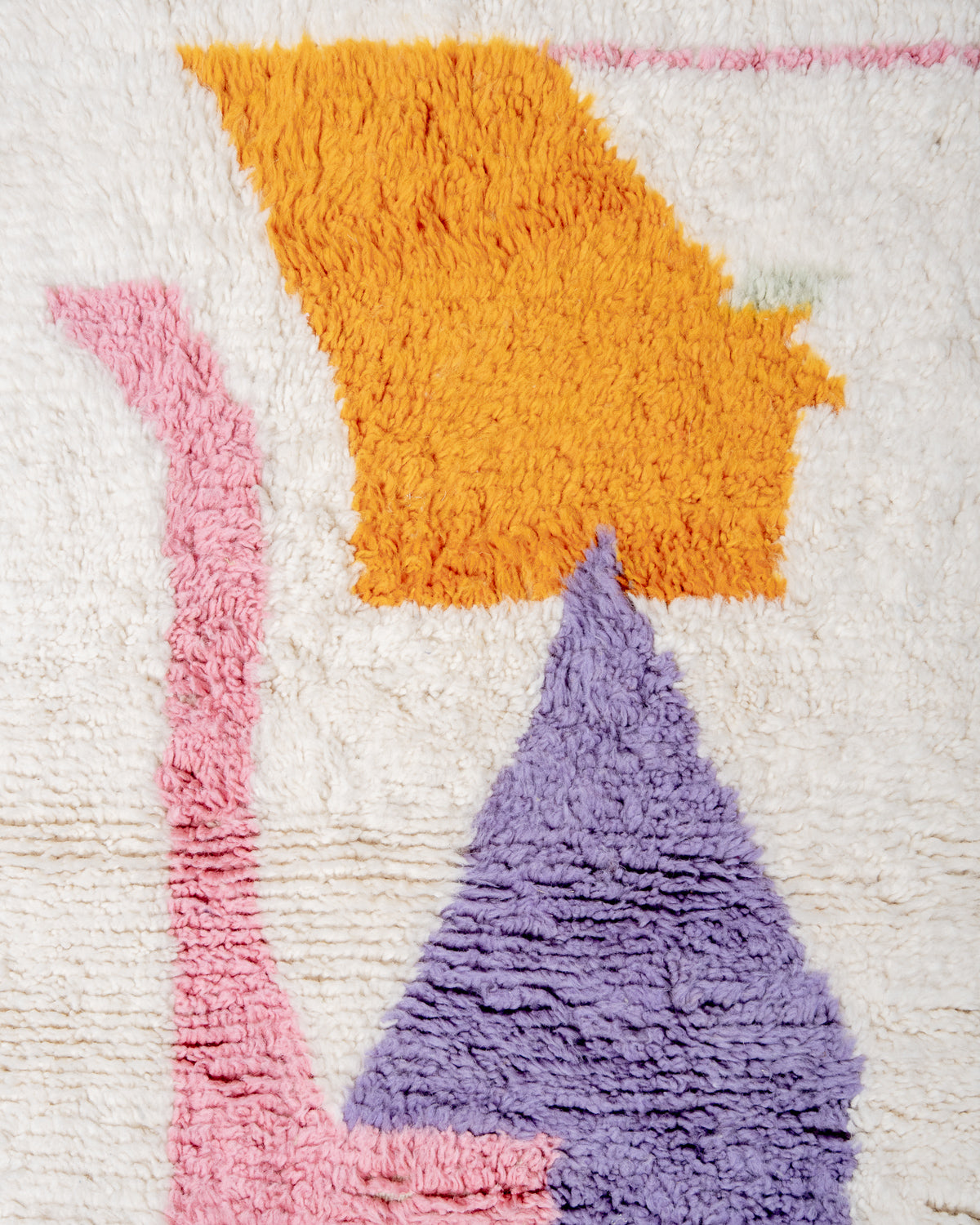 Modern, designer, handcrafted Berber rug from Morocco. Beniourain carpet with beautiful colours and patterns and fluffy wool texture.