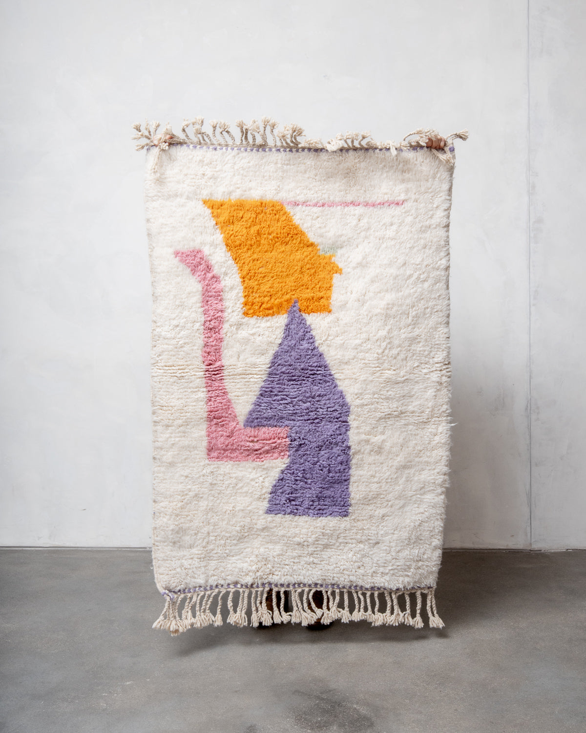 Modern, designer, handcrafted Berber rug from Morocco. Beniourain carpet with beautiful colours and patterns and fluffy wool texture.