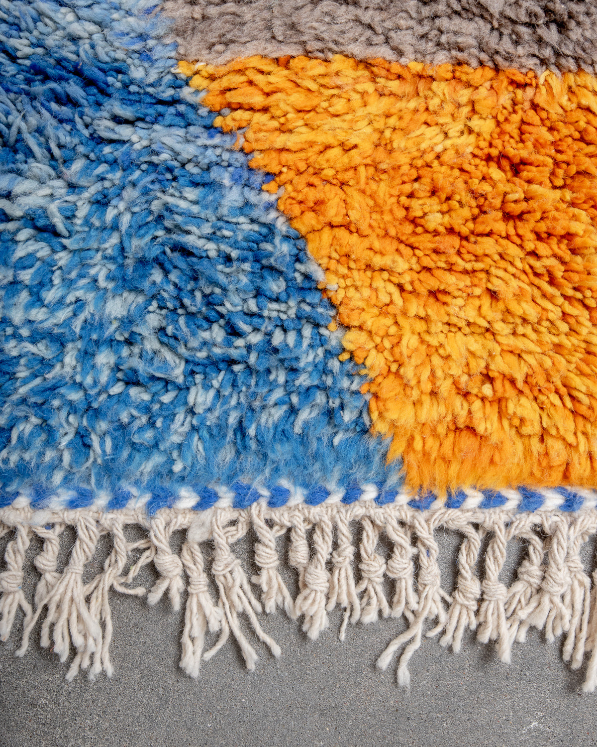 Modern, designer, handcrafted Berber rug from Morocco. Beniourain carpet with beautiful colours and patterns and fluffy wool texture.