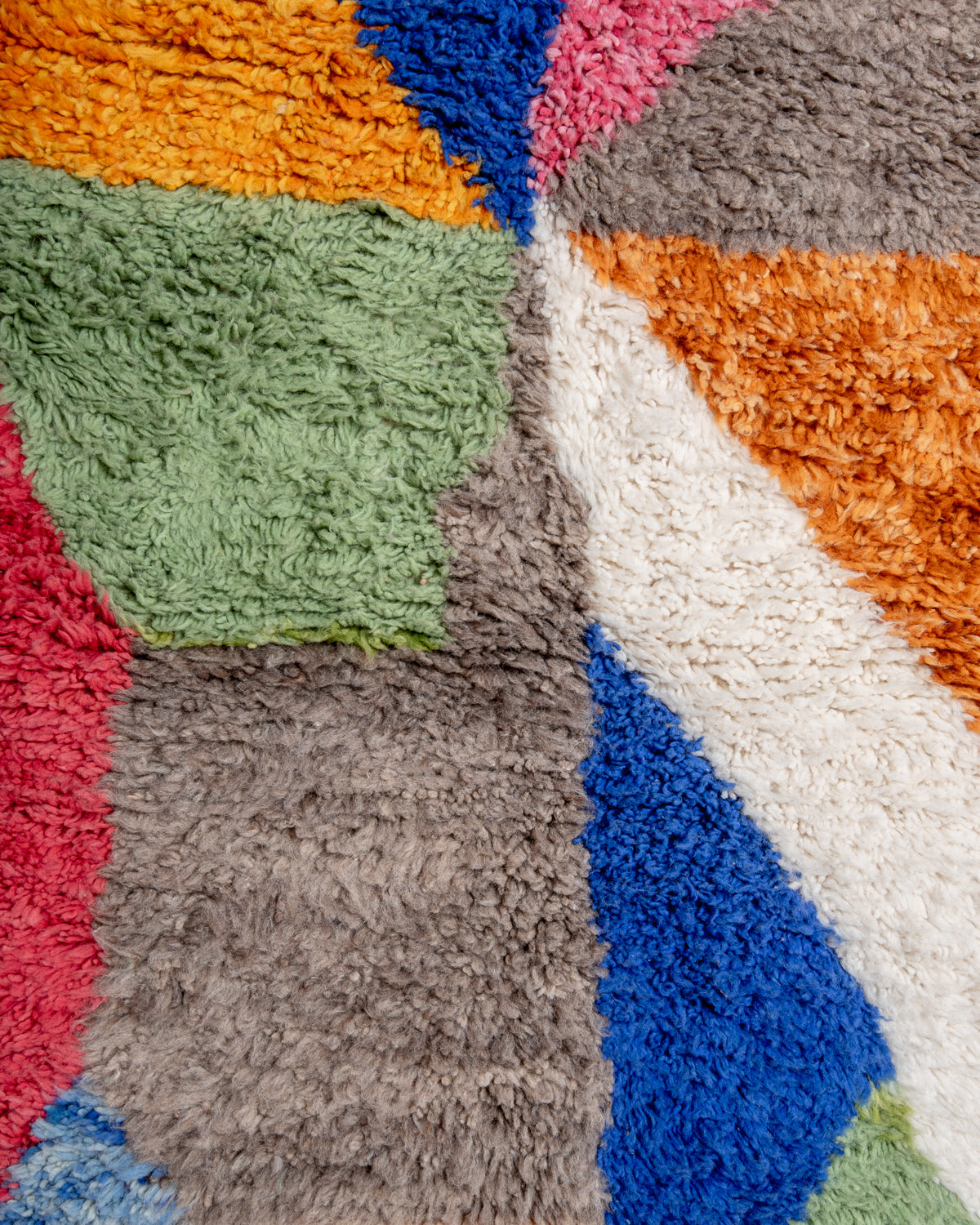 Modern, designer, handcrafted Berber rug from Morocco. Beniourain carpet with beautiful colours and patterns and fluffy wool texture.