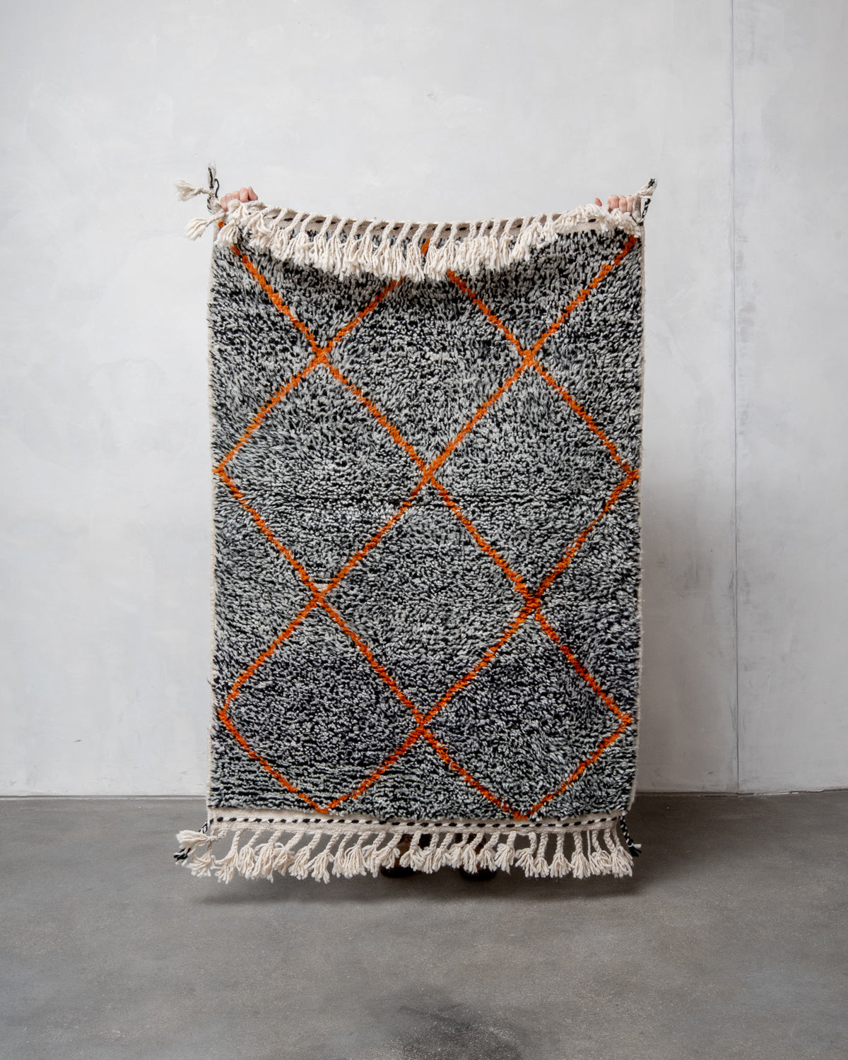 Modern, designer, handcrafted Berber rug from Morocco. Beniourain carpet with beautiful colours and patterns and fluffy wool texture.