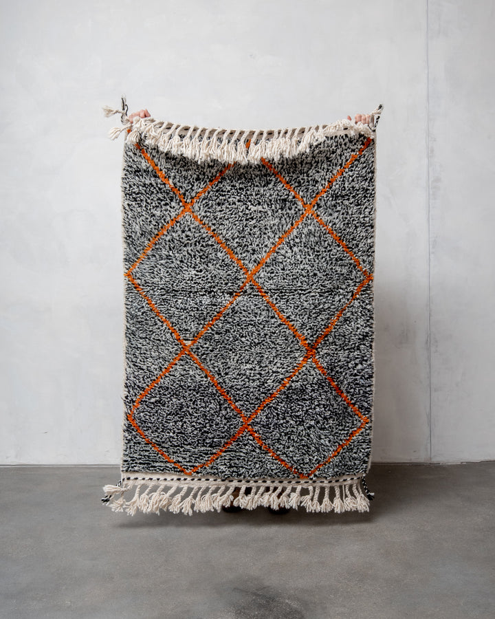 Modern, designer, handcrafted Berber rug from Morocco. Beniourain carpet with beautiful colours and patterns and fluffy wool texture.