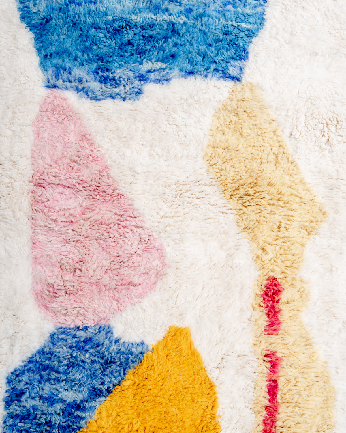 Modern, designer, handcrafted Berber rug from Morocco. Beniourain carpet with beautiful colours and patterns and fluffy wool texture.