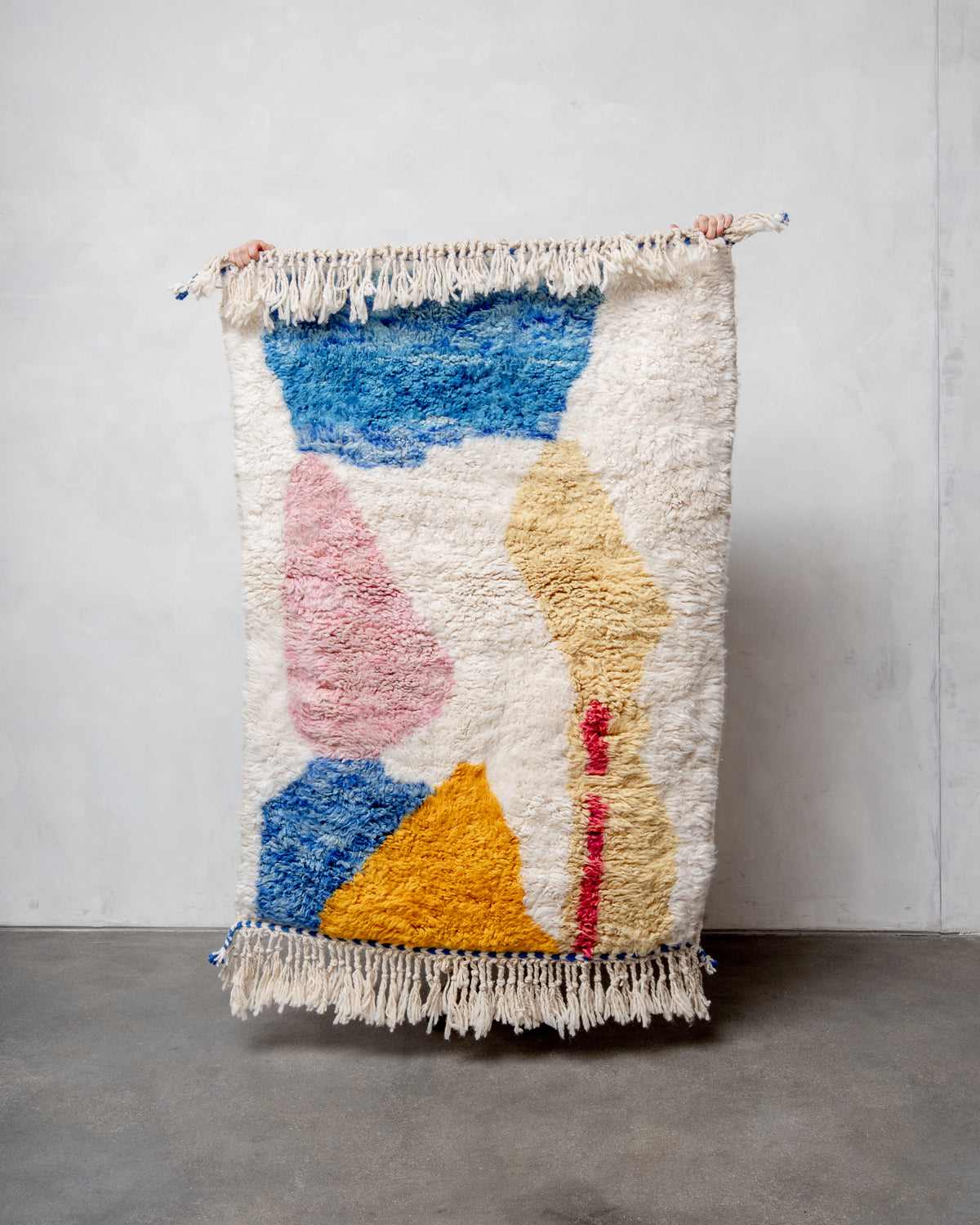 Modern, designer, handcrafted Berber rug from Morocco. Beniourain carpet with beautiful colours and patterns and fluffy wool texture.