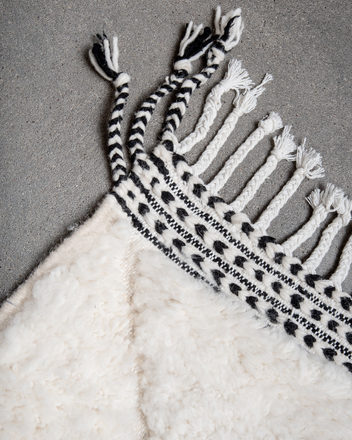 Modern, designer, handcrafted Berber rug from Morocco. Beniourain carpet with minimalist design, natural wool pile and a fluffy texture.