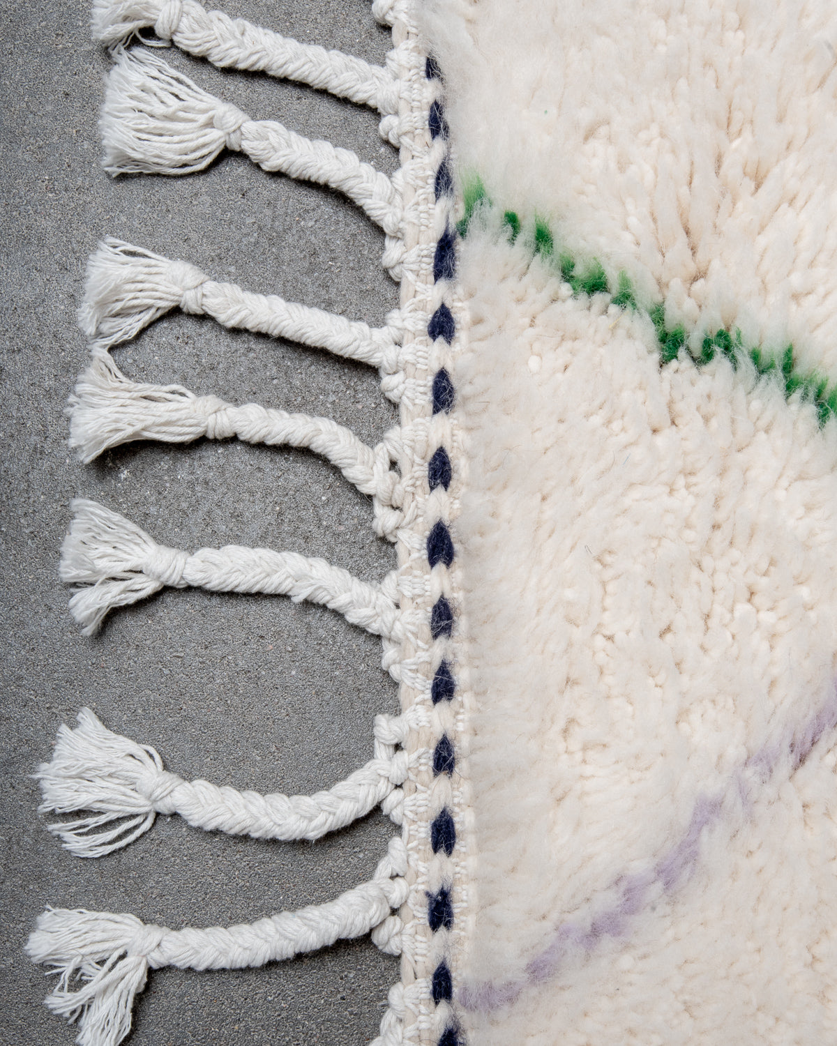 Modern, designer, handcrafted Berber rug from Morocco. Beniourain carpet with beautiful colours and patterns and fluffy wool texture.