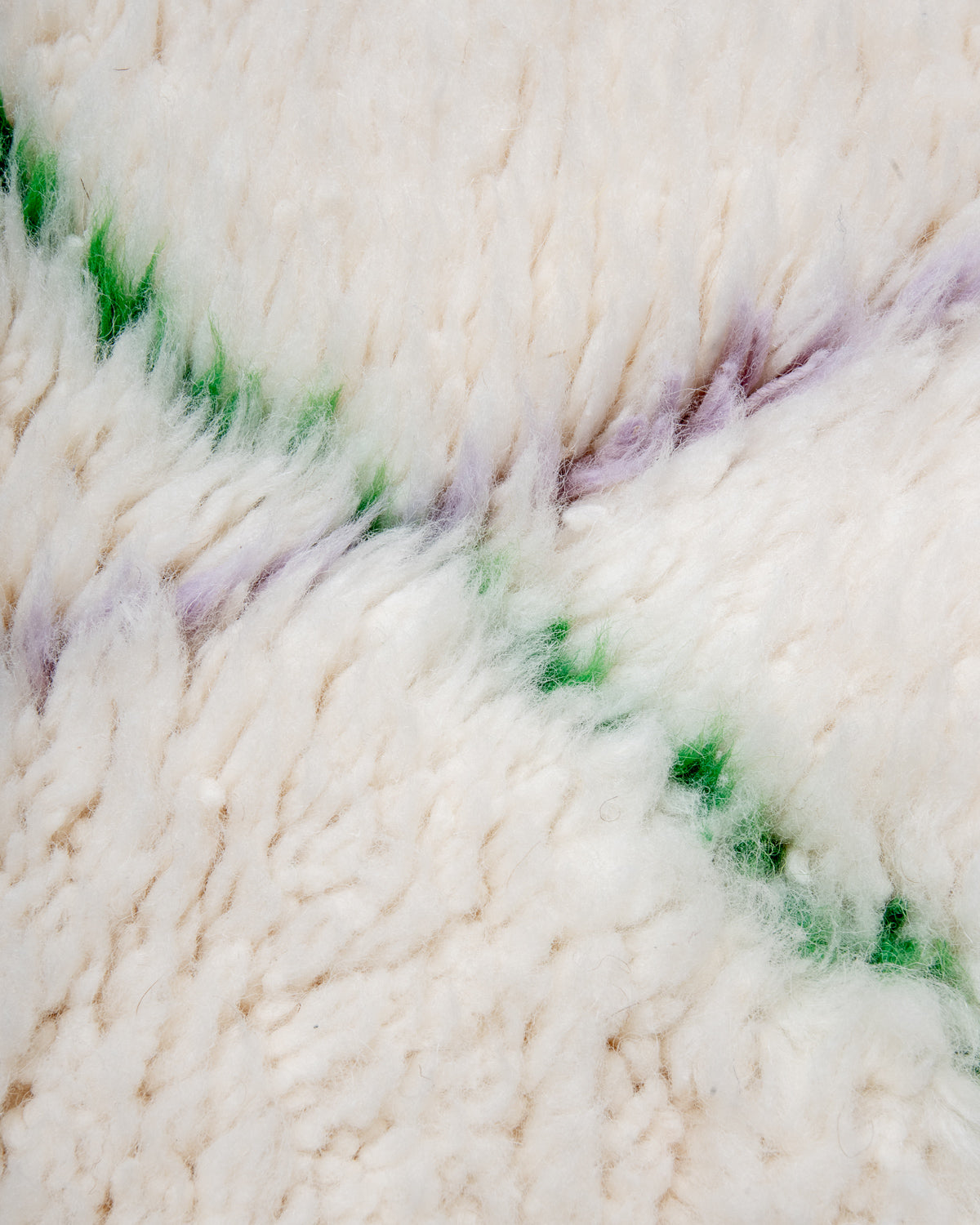 Modern, designer, handcrafted Berber rug from Morocco. Beniourain carpet with beautiful colours and patterns and fluffy wool texture.