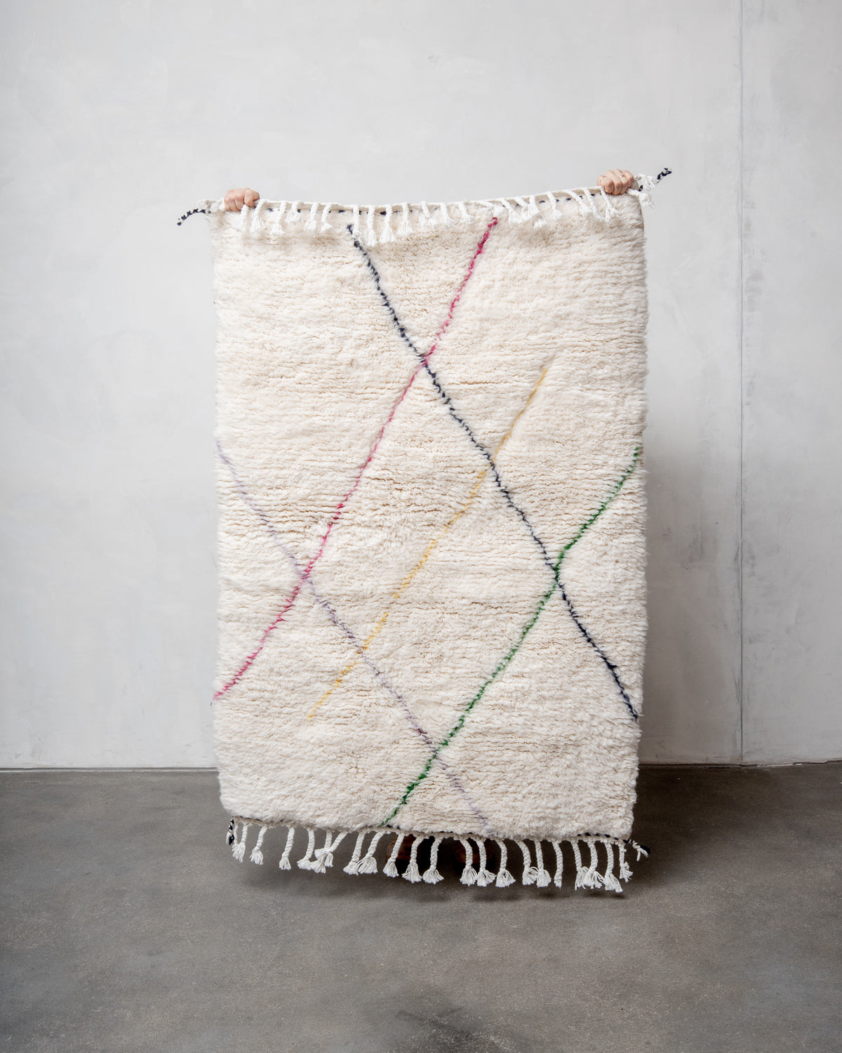 Modern, designer, handcrafted Berber rug from Morocco. Beniourain carpet with beautiful colours and patterns and fluffy wool texture.