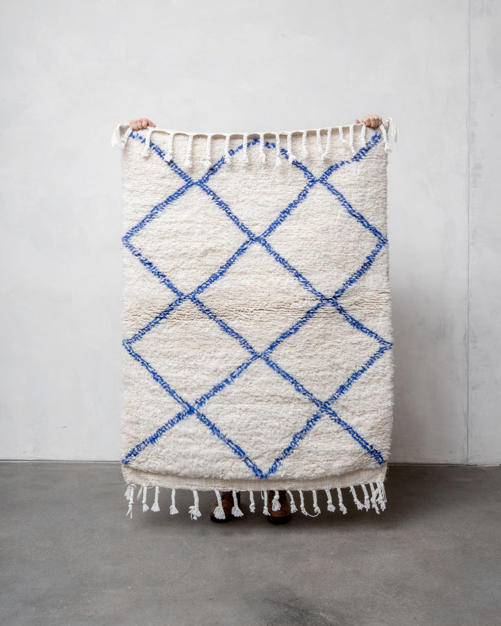 Modern, designer, handcrafted Berber rug from Morocco. Beniourain carpet with beautiful colours and patterns and fluffy wool texture.