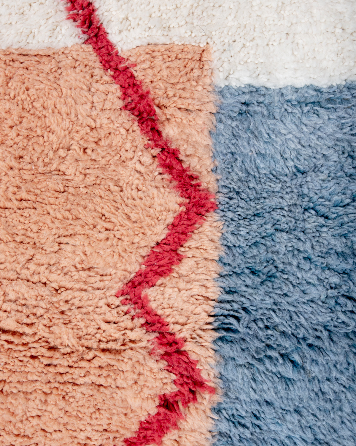 Modern, designer, handcrafted Berber rug from Morocco. Beniourain carpet with beautiful colours and patterns and fluffy wool texture.