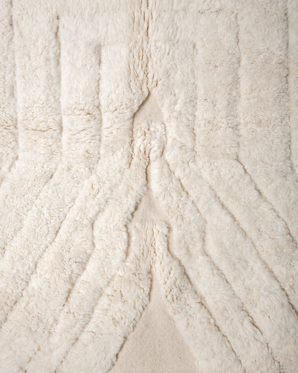 Modern, designer, handcrafted Berber rug from Morocco. Beniourain carpet with minimalist design, natural wool pile and a fluffy texture.