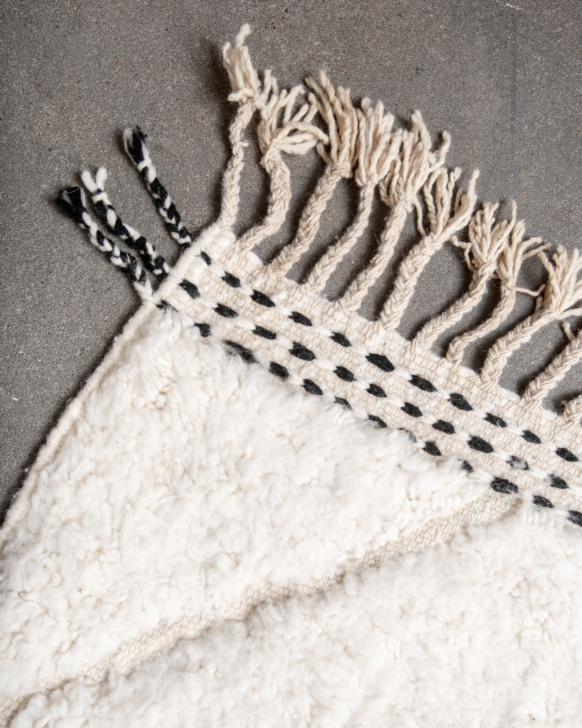 Modern, designer, handcrafted Berber rug from Morocco. Beniourain carpet with minimalist design, natural wool pile and a fluffy texture.