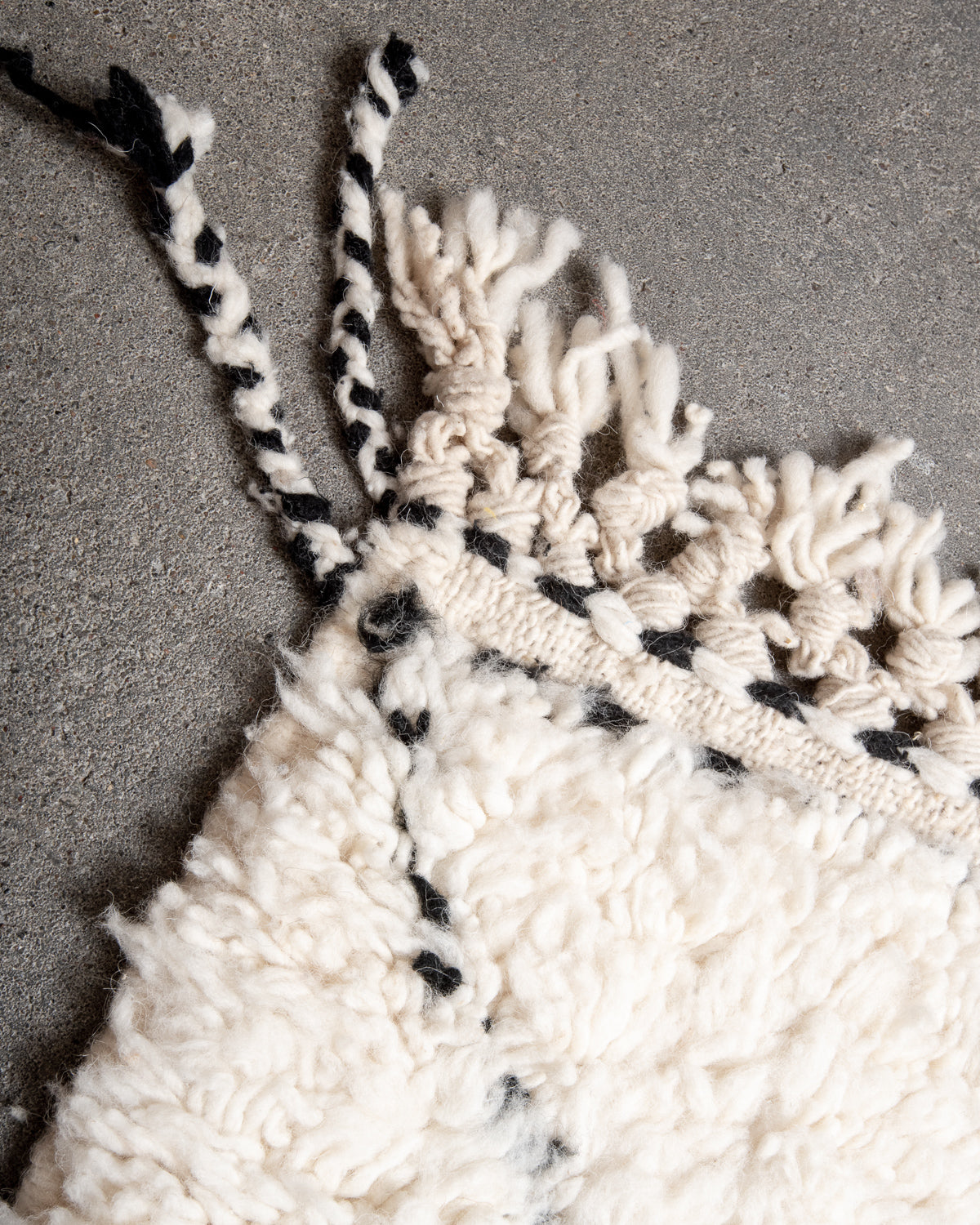 Modern, designer, handcrafted Berber rug from Morocco. Beniourain carpet with minimalist design, natural wool pile and a fluffy texture.