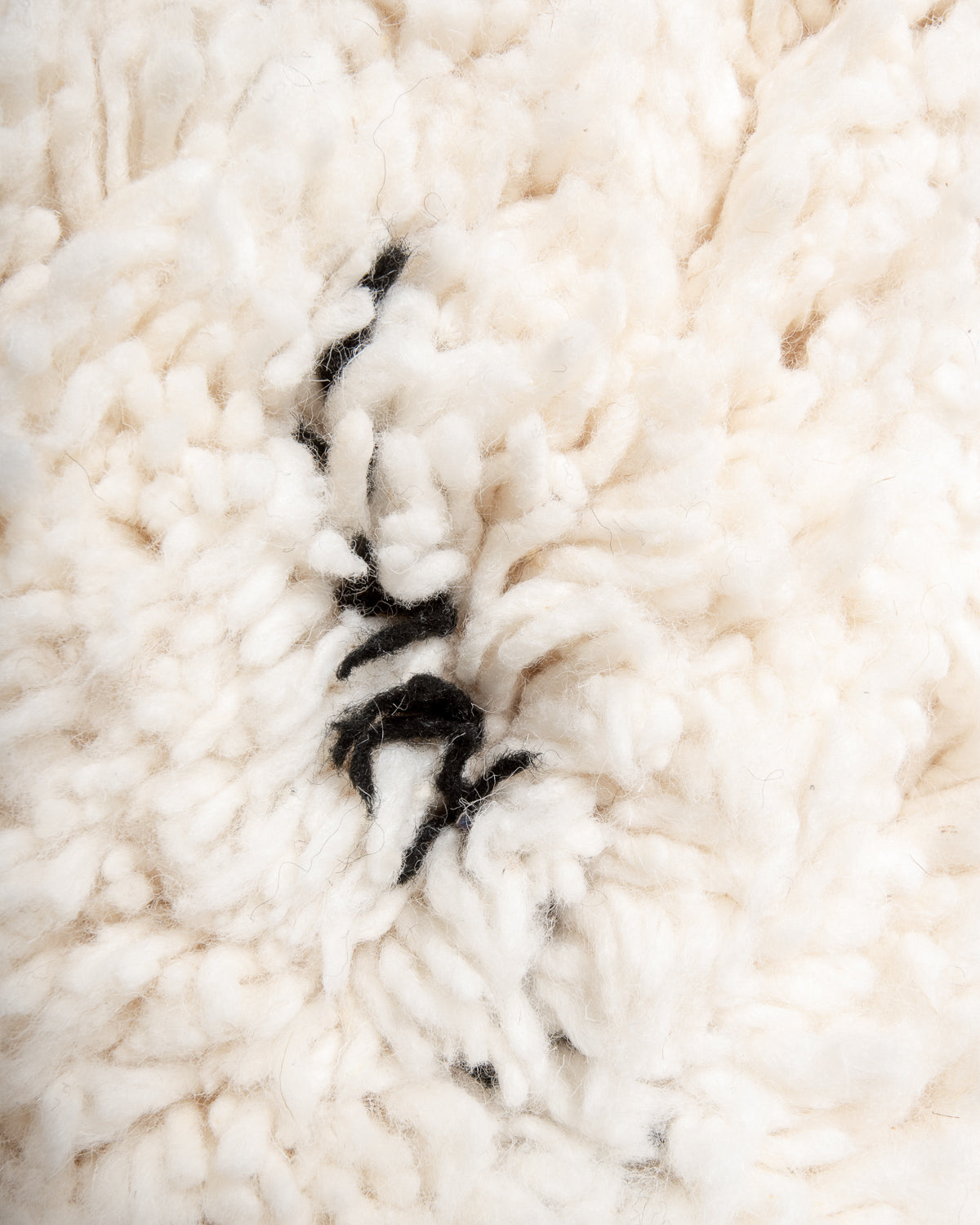 Modern, designer, handcrafted Berber rug from Morocco. Beniourain carpet with minimalist design, natural wool pile and a fluffy texture.