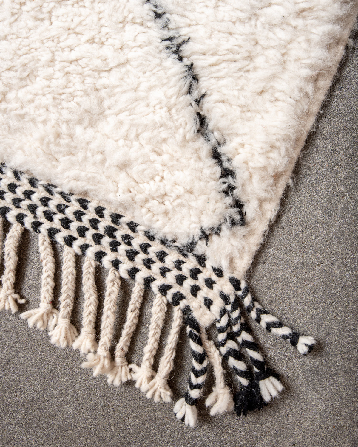 Modern, designer, handcrafted Berber rug from Morocco. Beniourain carpet with minimalist design, natural wool pile and a fluffy texture.