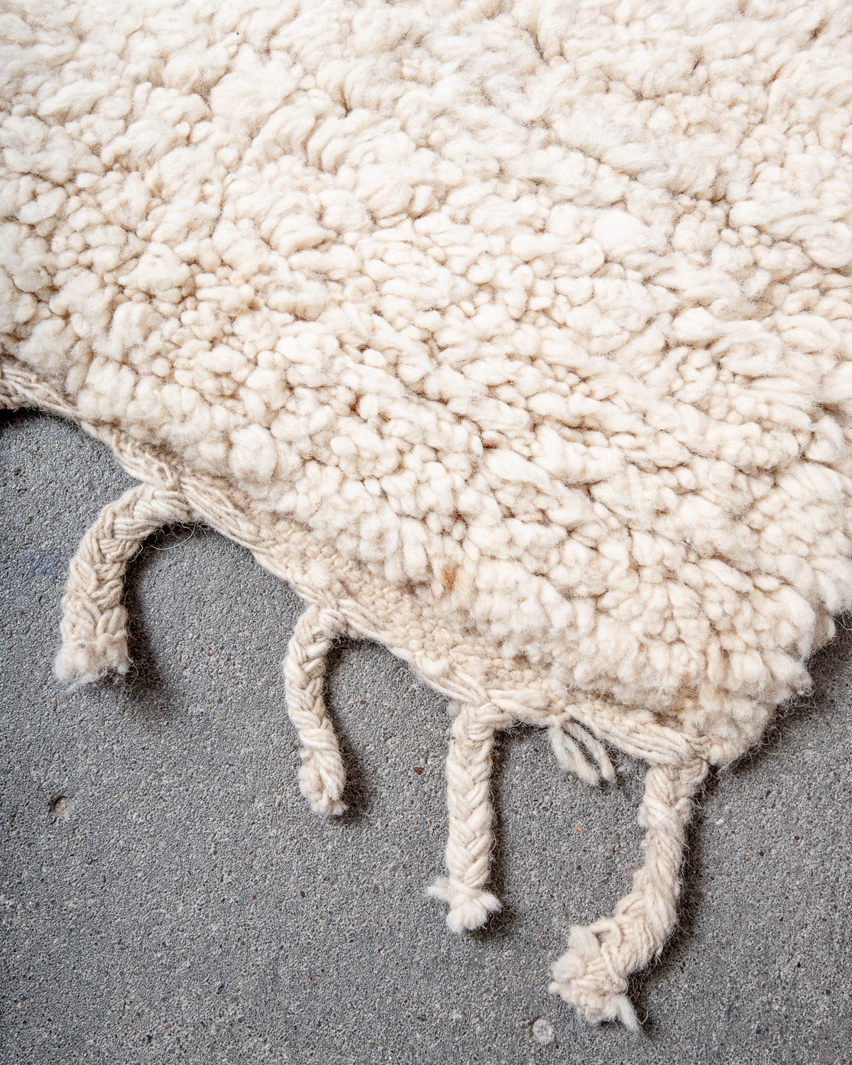 Modern, designer, handcrafted Berber rug from Morocco. Beniourain carpet with minimalist design, natural wool pile and a fluffy texture.