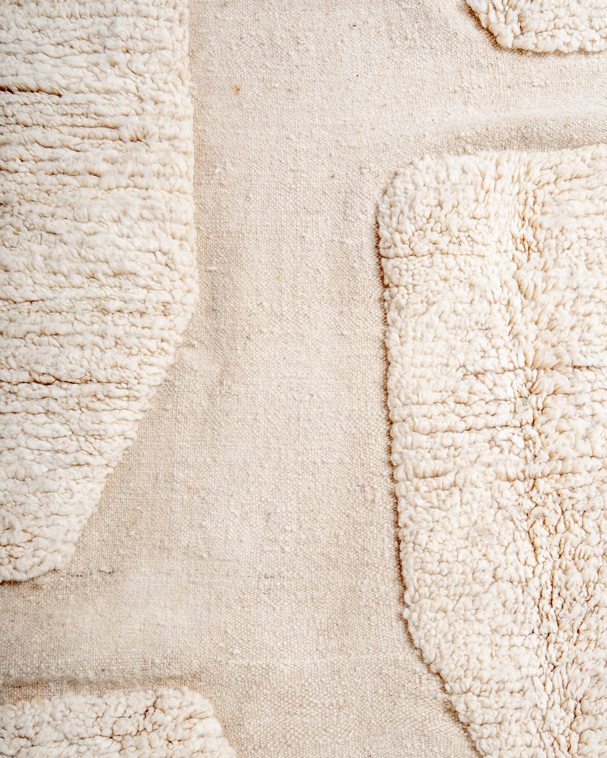 Modern, designer, handcrafted Berber rug from Morocco. Beniourain carpet with minimalist design, natural wool pile and a fluffy texture.