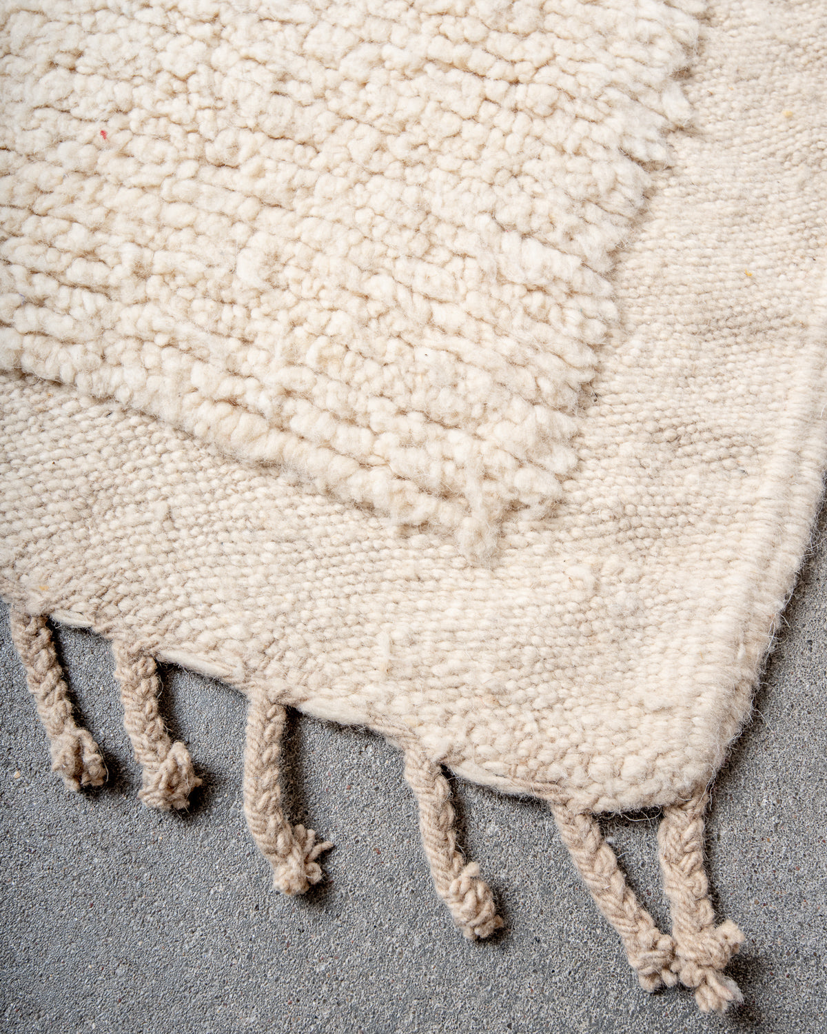 Modern, designer, handcrafted Berber rug from Morocco. Beniourain carpet with minimalist design, natural wool pile and a fluffy texture.