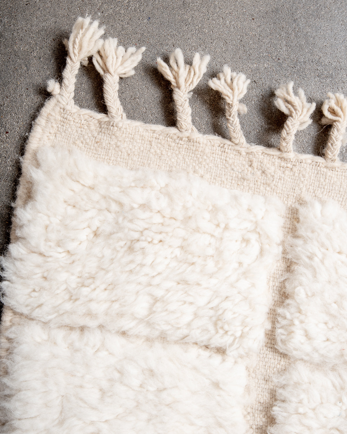 Modern, designer, handcrafted Berber rug from Morocco. Beniourain carpet with minimalist design, natural wool pile and a fluffy texture.