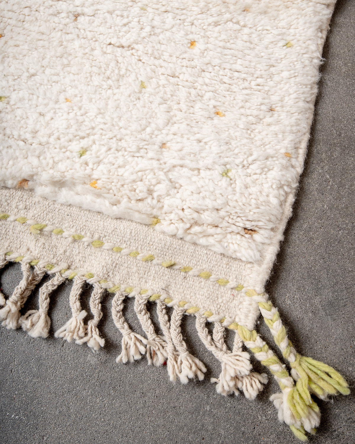 Modern, designer, handcrafted Berber rug from Morocco. Beniourain carpet with beautiful colours and patterns and fluffy wool texture.