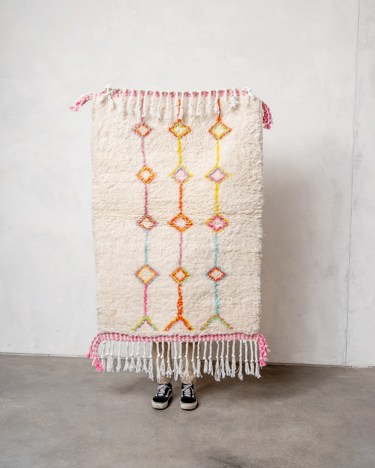 Modern, designer, handcrafted Berber rug from Morocco. Beniourain carpet with beautiful colours and patterns and fluffy wool texture.