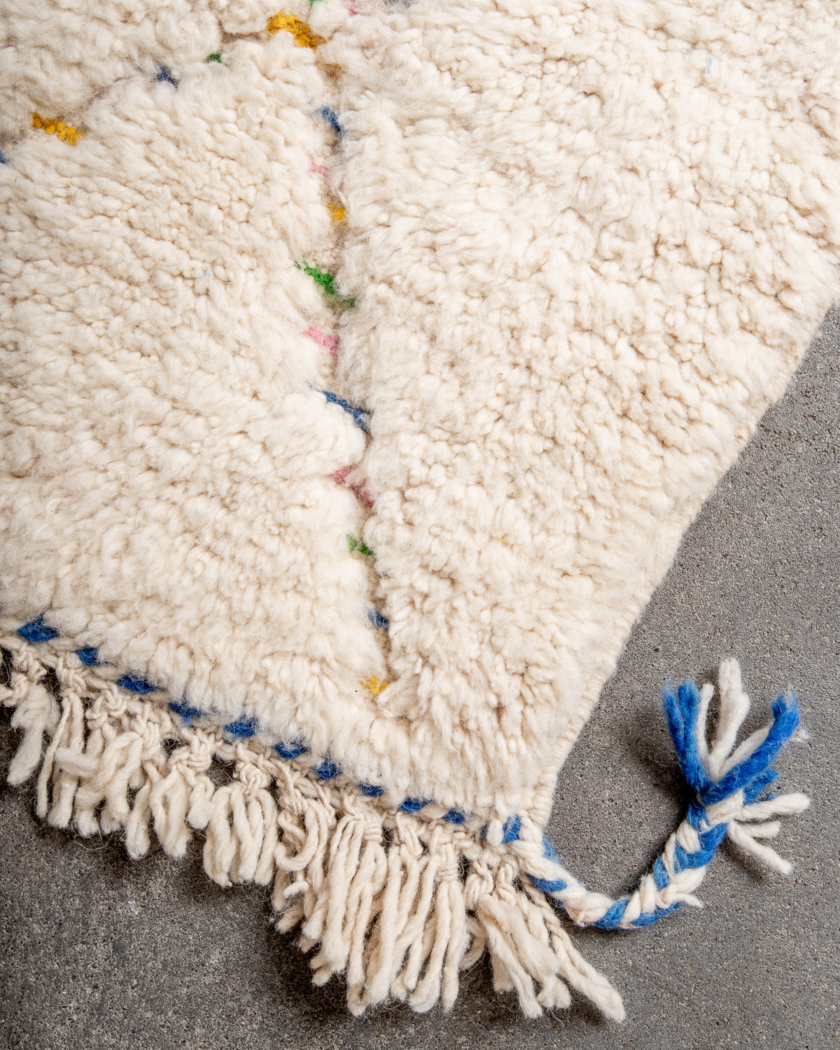 Modern, designer, handcrafted Berber rug from Morocco. Beniourain carpet with beautiful colours and patterns and fluffy wool texture.