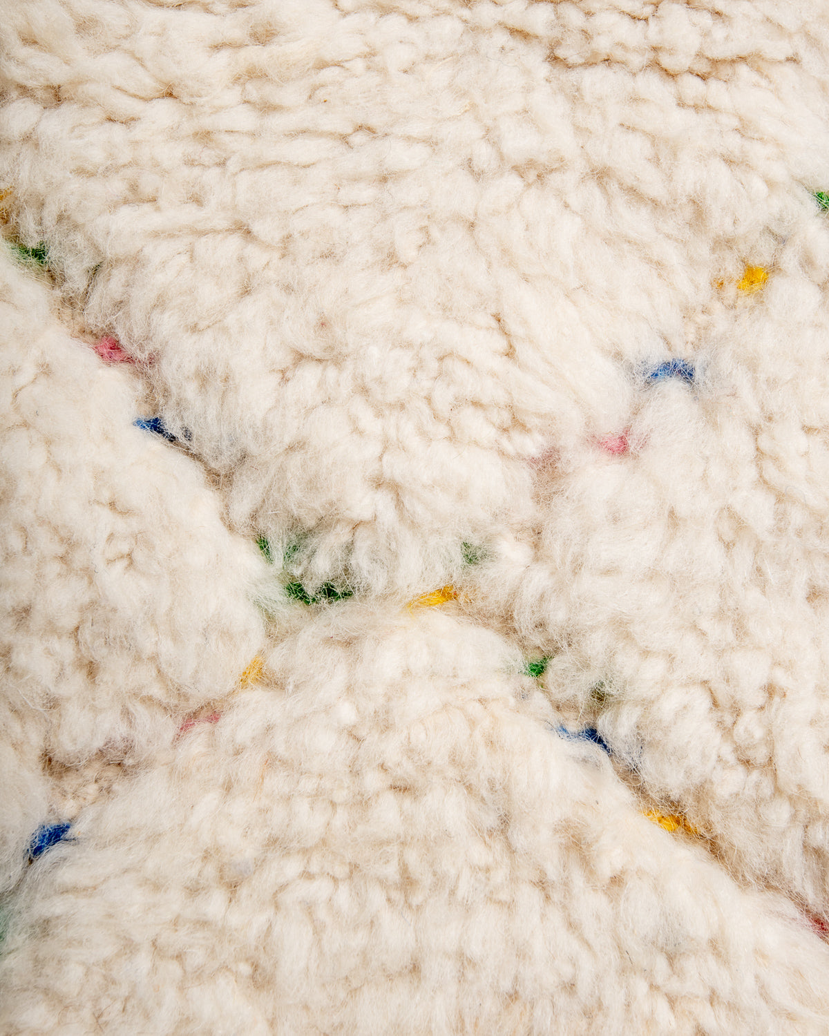 Modern, designer, handcrafted Berber rug from Morocco. Beniourain carpet with beautiful colours and patterns and fluffy wool texture.