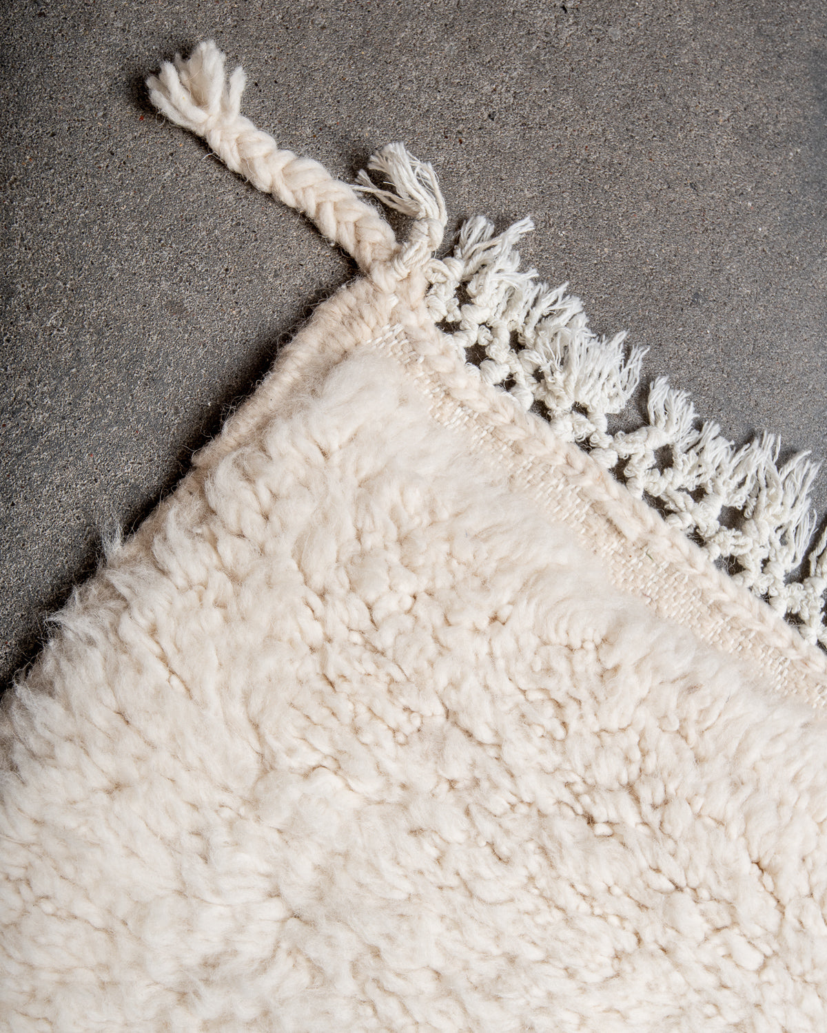 Modern, designer, handcrafted Berber rug from Morocco. Beniourain carpet with minimalist design, natural wool pile and a fluffy texture.
