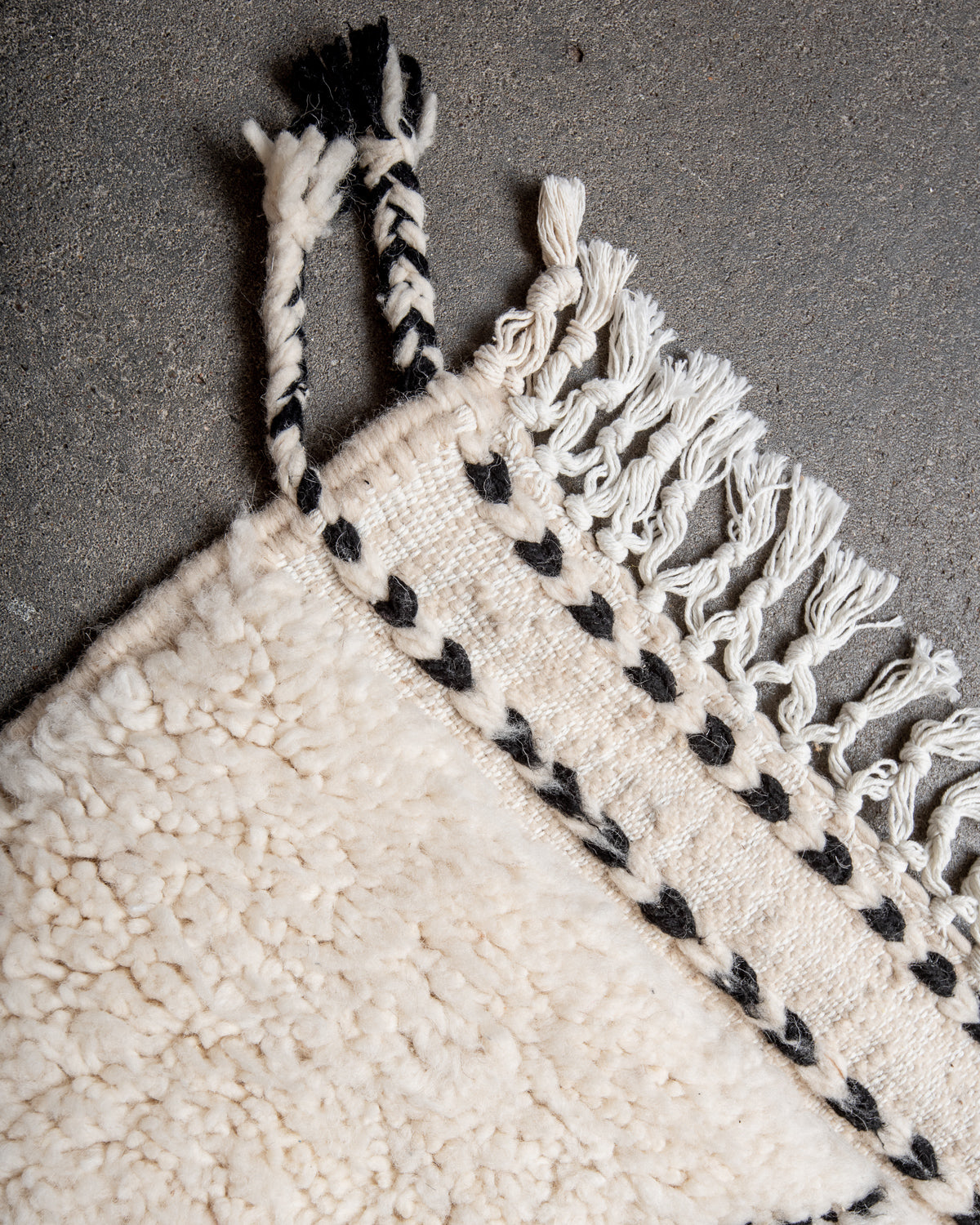 Modern, designer, handcrafted Berber rug from Morocco. Beniourain carpet with minimalist design, natural wool pile and a fluffy texture.