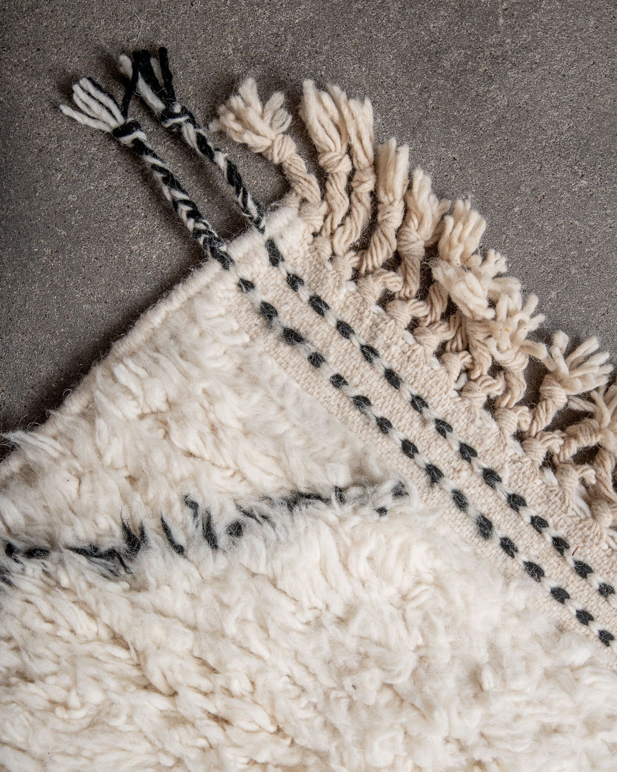Modern, designer, handcrafted Berber rug from Morocco. Beniourain carpet with minimalist design, natural wool pile and a fluffy texture.