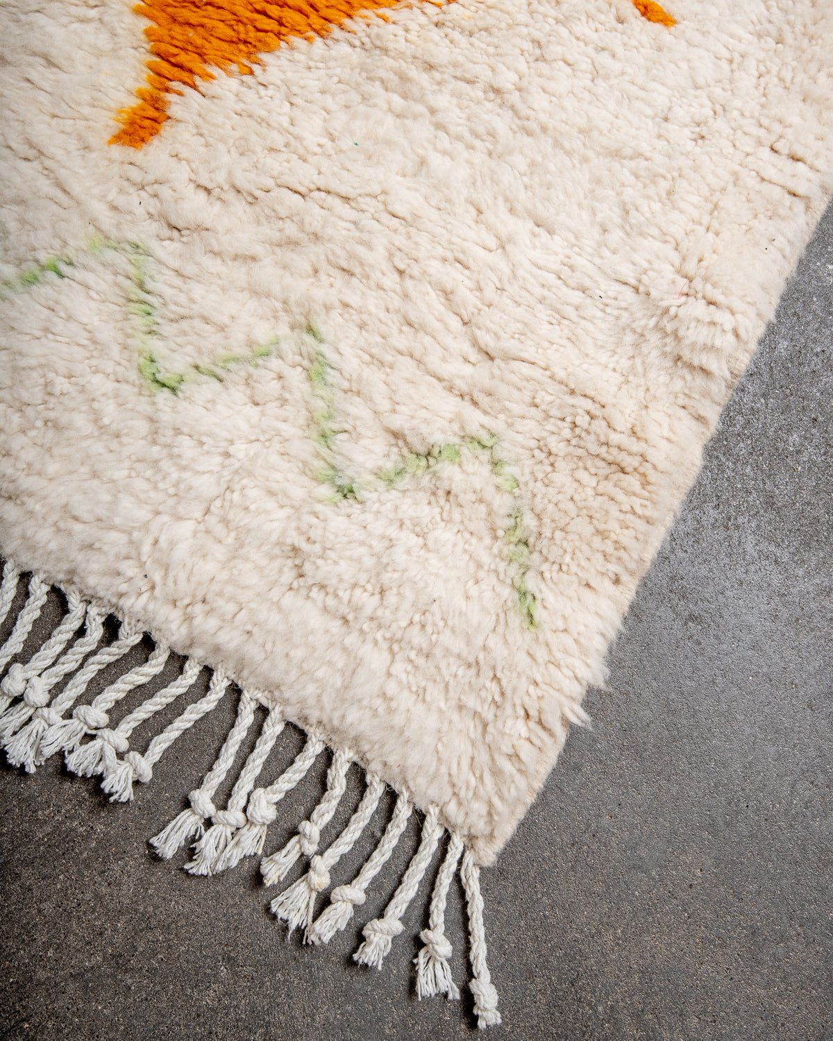 Modern, designer, handcrafted Berber rug from Morocco. Beniourain carpet with beautiful colours and patterns and fluffy wool texture.