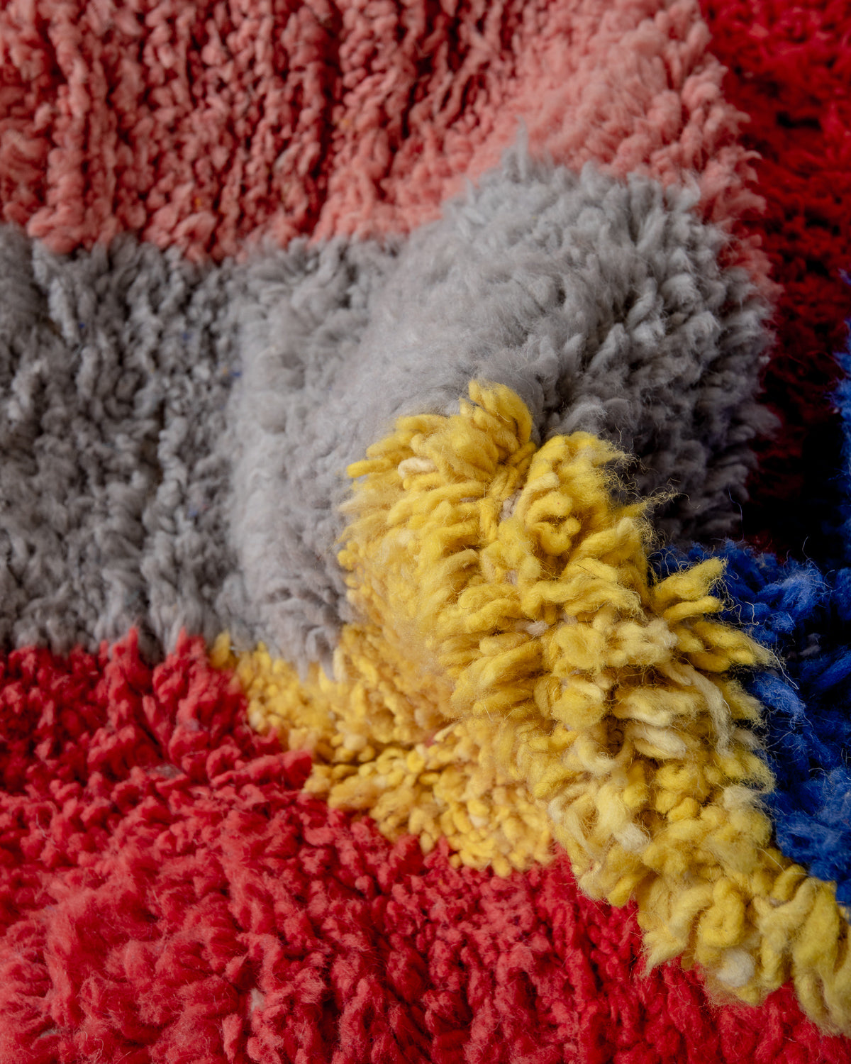 Modern, designer, handcrafted Berber rug from Morocco. Beniourain carpet with beautiful colours and patterns and fluffy wool texture.