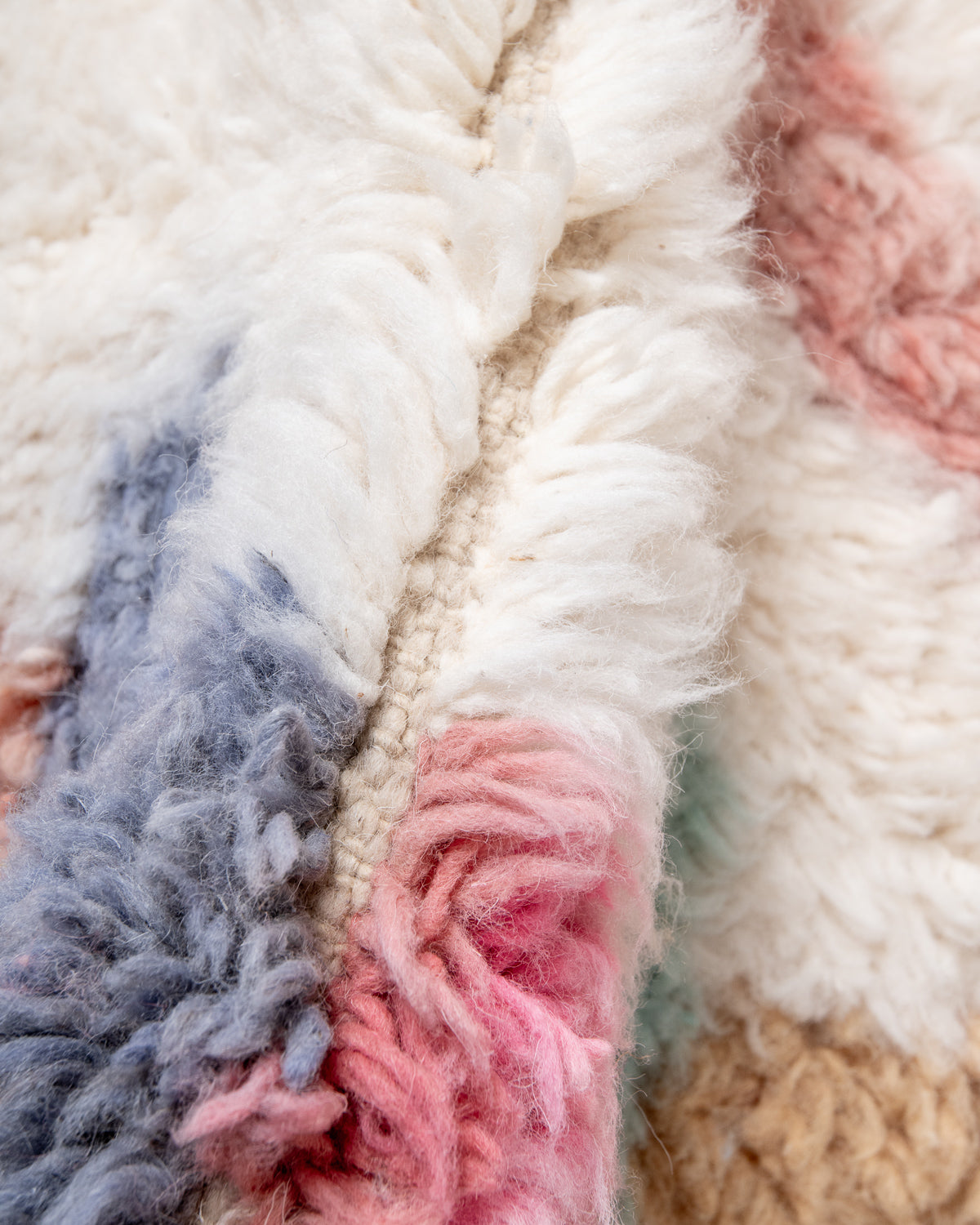 Modern, designer, handcrafted Berber rug from Morocco. Beniourain carpet with beautiful colours and patterns and fluffy wool texture