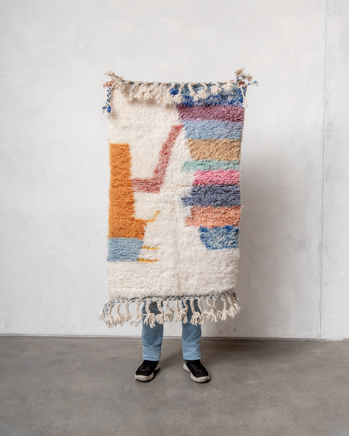 Modern, designer, handcrafted Berber rug from Morocco. Beniourain carpet with beautiful colours and patterns and fluffy wool texture