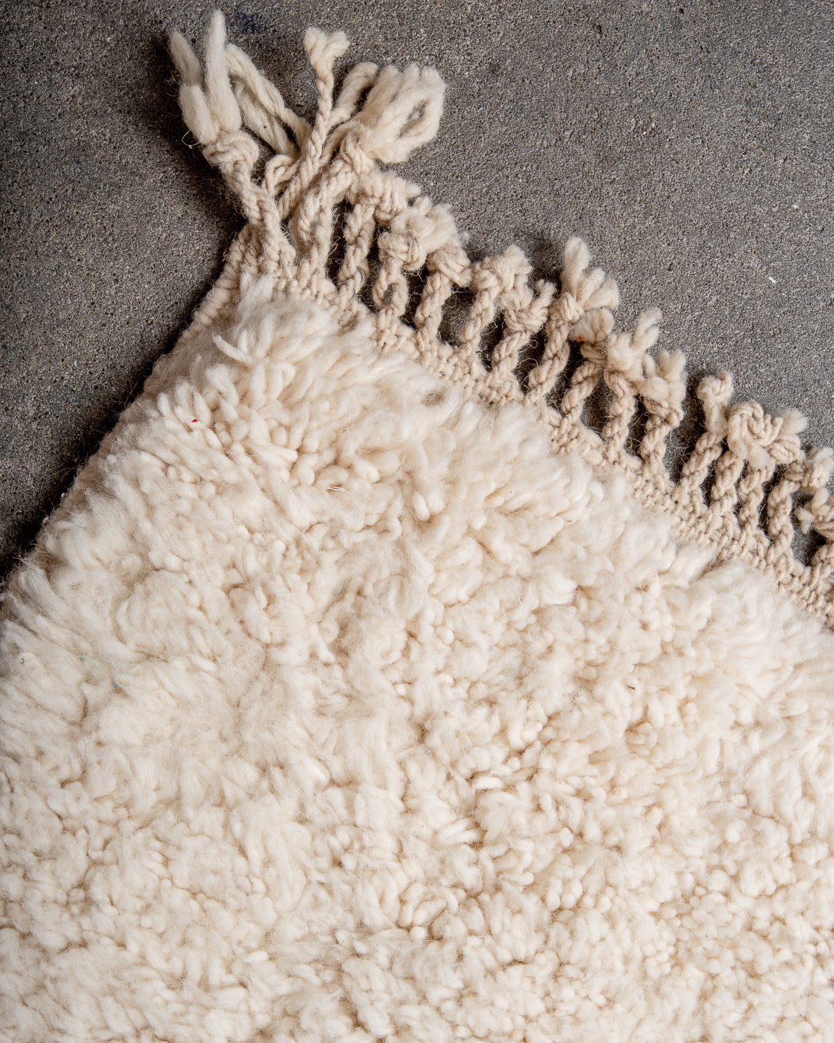 Modern, designer, handcrafted Berber rug from Morocco. Beniourain carpet with minimalist design, natural wool pile and a fluffy texture.