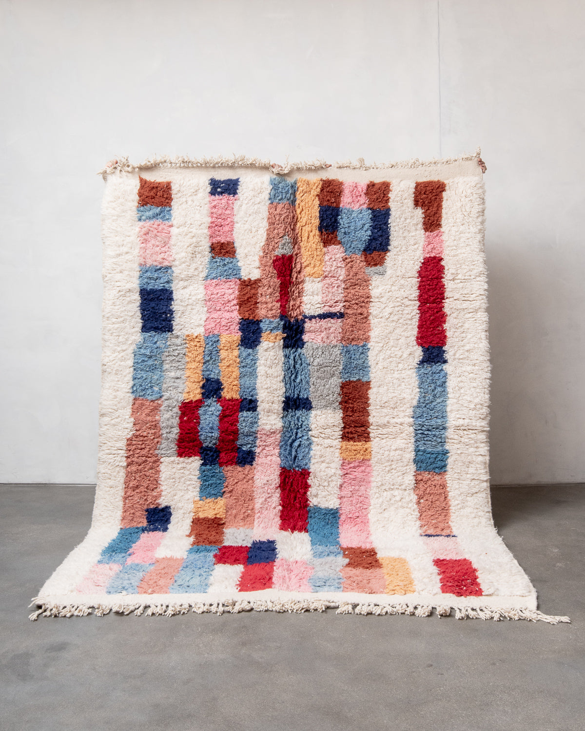 Modern, designer, handcrafted Berber rug from Morocco. Beniourain carpet with beautiful colours and patterns and fluffy wool texture.