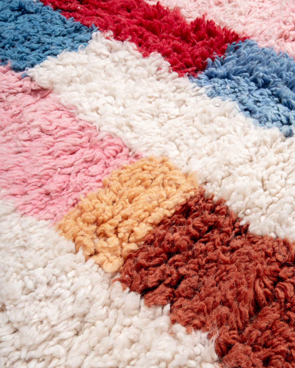 Modern, designer, handcrafted Berber rug from Morocco. Beniourain carpet with beautiful colours and patterns and fluffy wool texture.