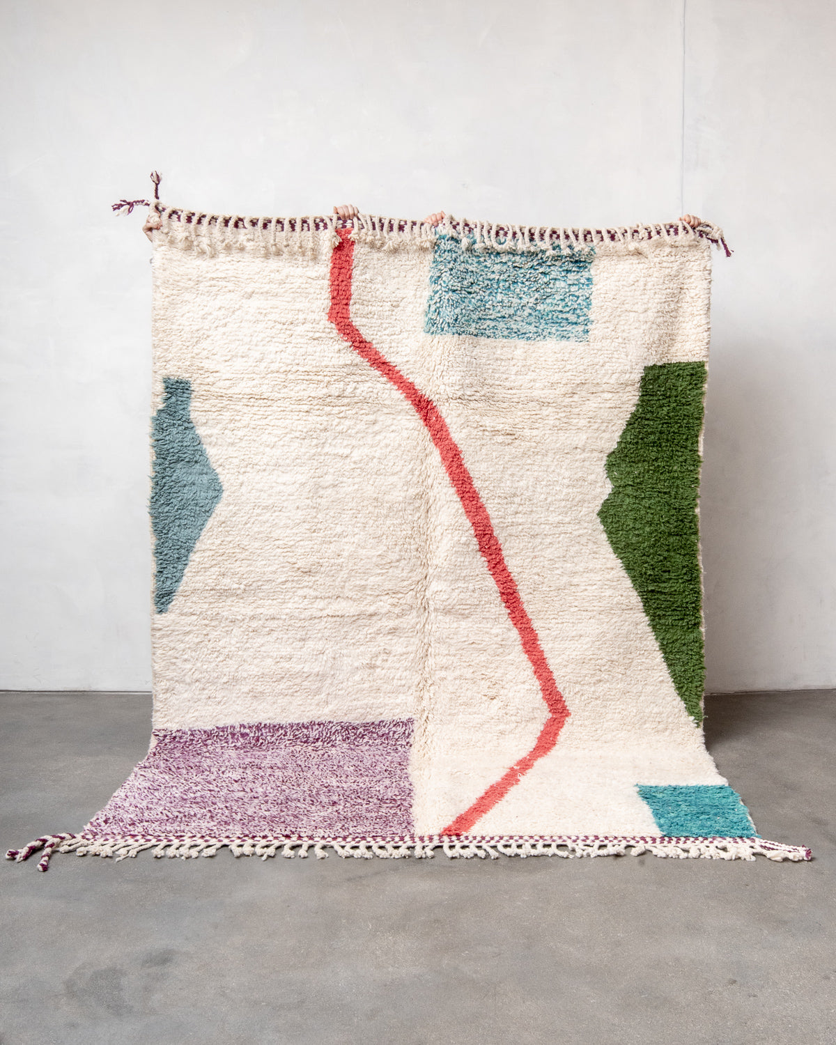 Modern, designer, handcrafted Berber rug from Morocco. Beniourain carpet with beautiful colours and patterns and fluffy wool texture.